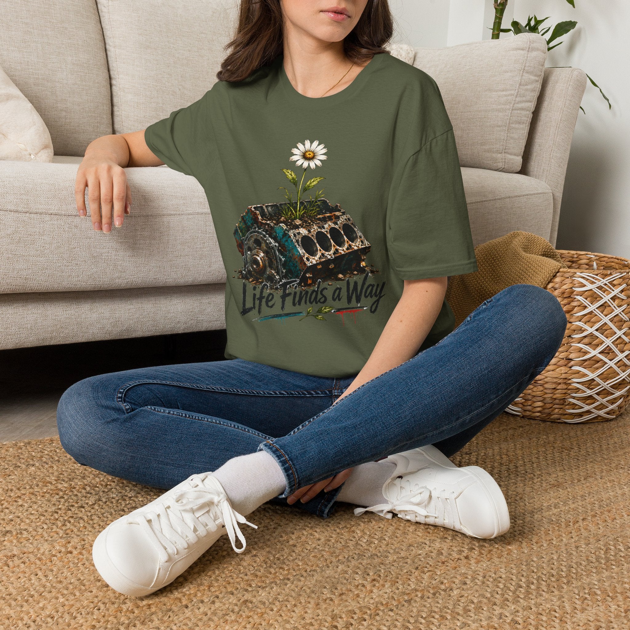 T-Shirt — 'Life Finds a Way' Daisy Rising from Rust Graphic Tee