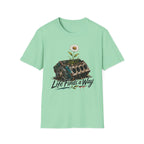 T-Shirt — 'Life Finds a Way' Daisy Rising from Rust Graphic Tee